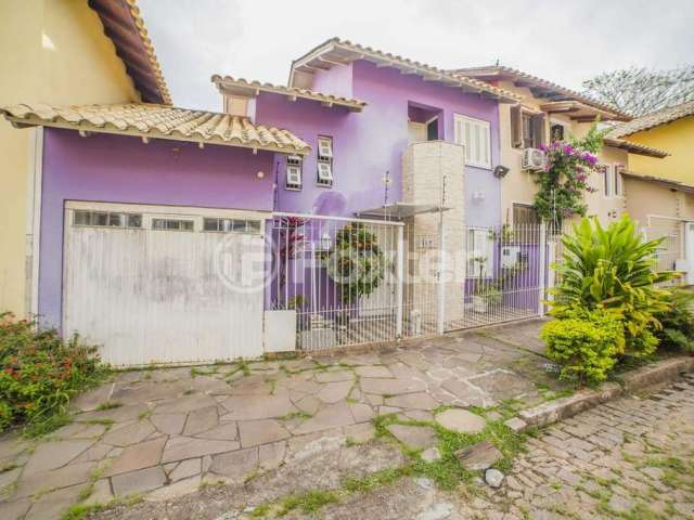 Casa com 2 quartos à venda na Rua Panambi, 197, Cavalhada, Porto Alegre, 118 m2 por R$ 399.000