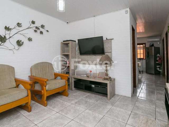 Casa com 3 quartos à venda na Rua Santa Mônica, 275, Ponta Grossa, Porto Alegre, 107 m2 por R$ 390.000