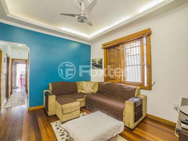 Casa com 5 quartos à venda na Rua Guilherme Schell, 161, Santo Antônio, Porto Alegre, 396 m2 por R$ 950.000