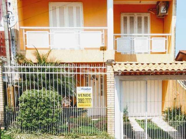 Casa com 3 quartos à venda na Rua Tesourinha, 174, Jardim Algarve, Alvorada, 220 m2 por R$ 371.000