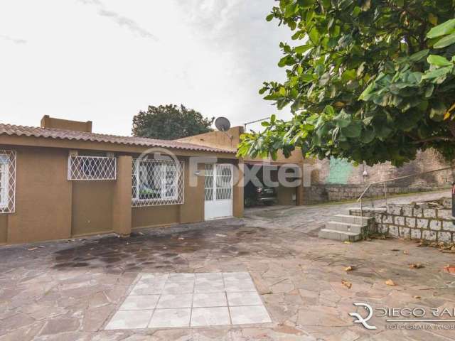 Casa com 3 quartos à venda na Rua Carlos Ferreira, 127, Teresópolis, Porto Alegre, 97 m2 por R$ 450.000