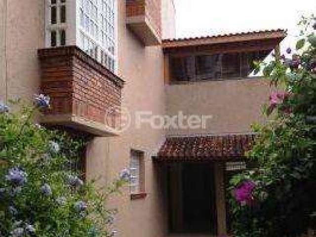 Casa em condomínio fechado com 3 quartos à venda na Rua Padre João Batista Reus, 1700, Vila Conceição, Porto Alegre, 245 m2 por R$ 958.000