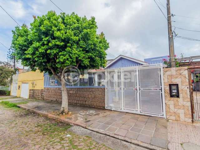 Casa com 4 quartos à venda na Rua Vinte e Um de Agosto, 72, Cavalhada, Porto Alegre, 300 m2 por R$ 700.000