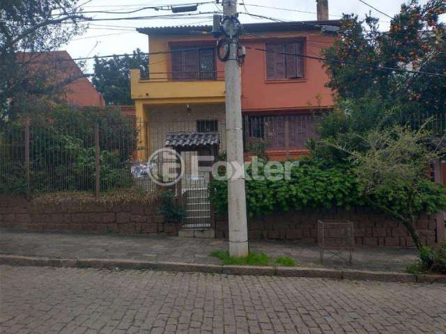 Casa com 3 quartos à venda na Rua Bispo William Thomas, 153, Teresópolis, Porto Alegre, 248 m2 por R$ 600.000