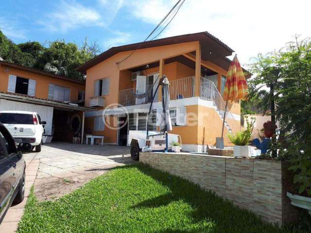 Casa com 3 quartos à venda na Rua José Alves de Castro, 468, Vila Nova, Porto Alegre, 200 m2 por R$ 690.000