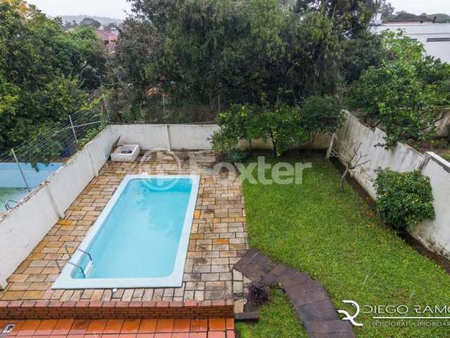 Casa com 3 quartos à venda na Rua Cariri, 400, Vila Assunção, Porto Alegre, 470 m2 por R$ 1.330.000