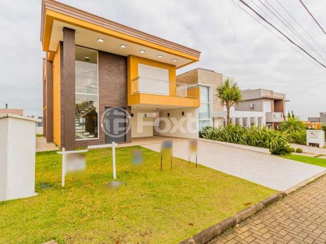 Casa em condomínio fechado com 3 quartos à venda na Avenida Senador Salgado Filho, 8500, Querência, Viamão, 221 m2 por R$ 1.650.000