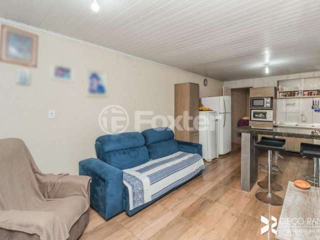 Casa com 3 quartos à venda na Rua Germano Bonow Filho, 379, Hípica, Porto Alegre, 100 m2 por R$ 256.500