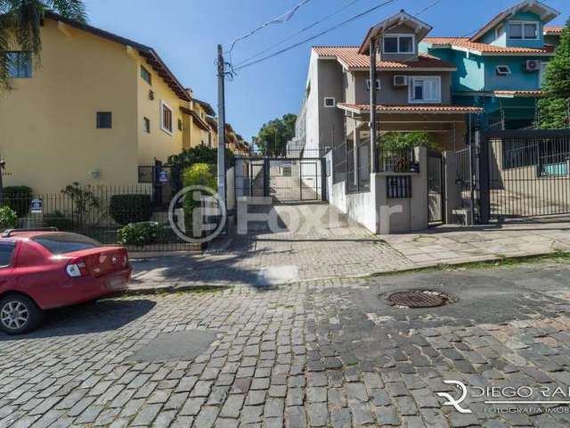 Casa em condomínio fechado com 3 quartos à venda na Rua Padre João Batista Reus, 2133, Camaquã, Porto Alegre, 152 m2 por R$ 470.000