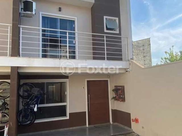 Casa em condomínio fechado com 3 quartos à venda na Rua Antônio Lourenço Rosa, 225, Mato Grande, Canoas, 94 m2 por R$ 405.000