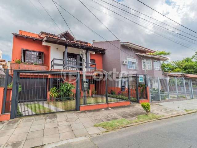 Casa com 3 quartos à venda na Travessa Kuluene, 319, Coronel Aparício Borges, Porto Alegre, 254 m2 por R$ 949.000