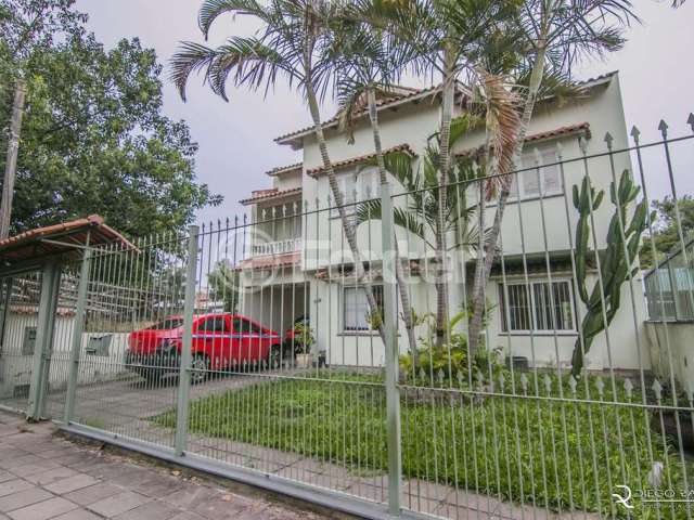 Casa com 4 quartos à venda na Rua Sílvio Silveira Soares, 2331, Camaquã, Porto Alegre, 193 m2 por R$ 836.000