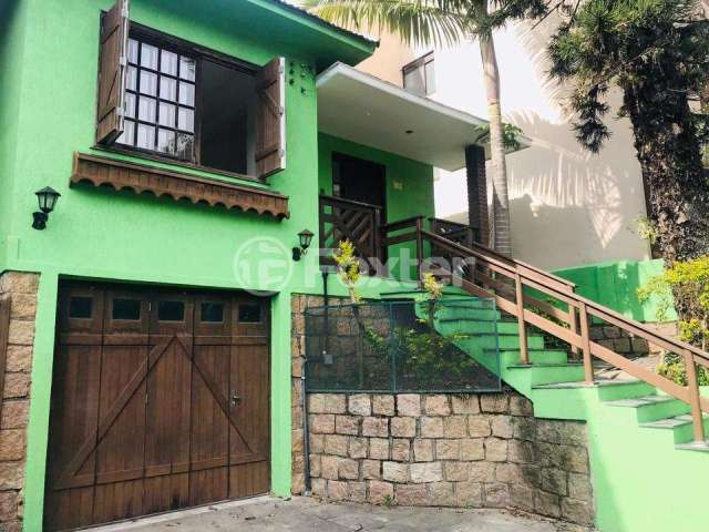 Casa com 4 quartos à venda na Rua Cangussu, 58, Nonoai, Porto Alegre, 184 m2 por R$ 590.000