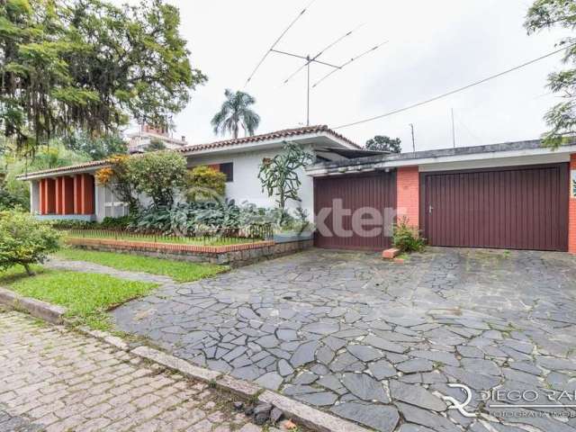 Casa com 4 quartos à venda na Travessa Trindade, 10, Jardim Lindóia, Porto Alegre, 252 m2 por R$ 1.080.000