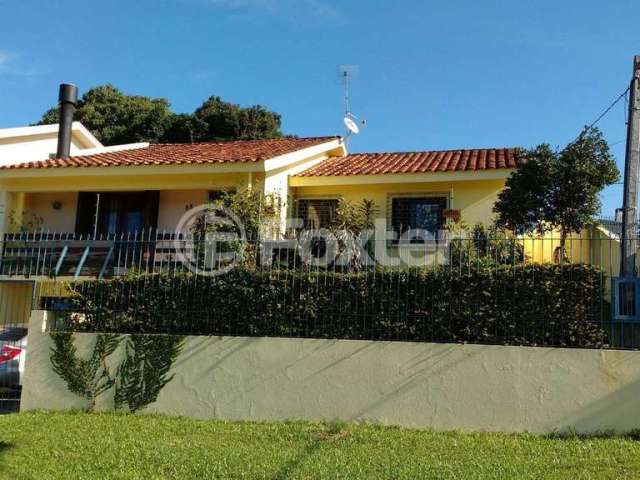 Casa com 3 quartos à venda na Rua Érico Veríssimo, 88, Tarumã, Viamão, 163 m2 por R$ 600.000