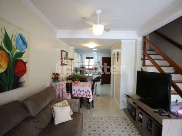 Casa em condomínio fechado com 3 quartos à venda na Rua Cangussu, 195, Nonoai, Porto Alegre, 100 m2 por R$ 356.250