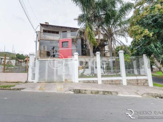 Casa com 3 quartos à venda na Avenida Luiz Moschetti, 425, Vila João Pessoa, Porto Alegre, 368 m2 por R$ 1.908.000