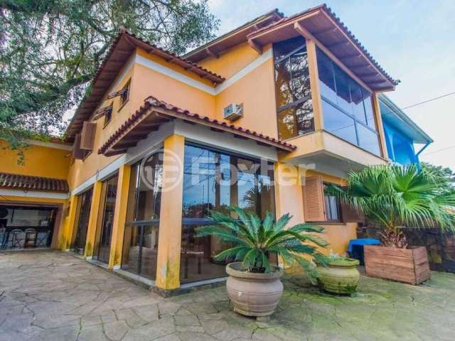 Casa com 4 quartos à venda na Rua Palermo, 105, Santa Isabel, Viamão, 360 m2 por R$ 600.000