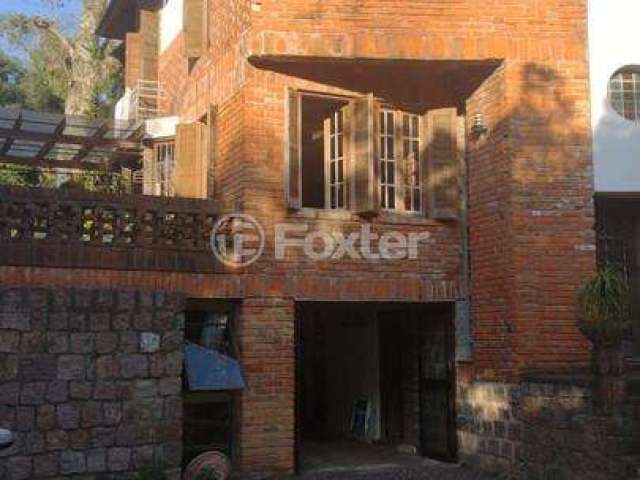 Casa com 2 quartos à venda na Rua Comendador José Júlio de Mello, 161, Teresópolis, Porto Alegre, 181 m2 por R$ 1.100.000