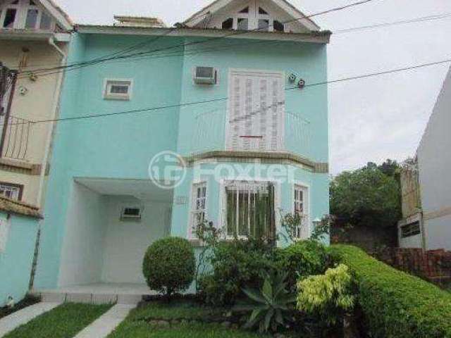 Casa em condomínio fechado com 3 quartos à venda na Rua Osório Mendes Ouriques, 332, Guarujá, Porto Alegre, 165 m2 por R$ 498.000