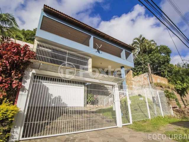 Casa com 4 quartos à venda na Rua Cleveland, 73, Santa Tereza, Porto Alegre, 287 m2 por R$ 980.000