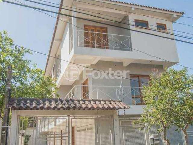 Casa em condomínio fechado com 3 quartos à venda na Rua Jamil Antônio José, 46, Nonoai, Porto Alegre, 193 m2 por R$ 859.000