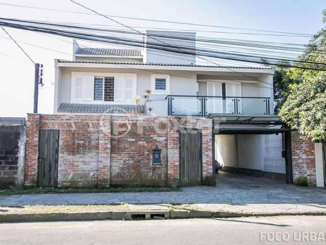 Casa com 6 quartos à venda na Rua Arapei, 228, Cristal, Porto Alegre, 500 m2 por R$ 1.142.000