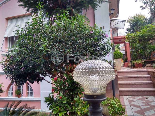Casa com 5 quartos à venda na Avenida Arnaldo Bohrer, 71, Teresópolis, Porto Alegre, 282 m2 por R$ 1.140.000
