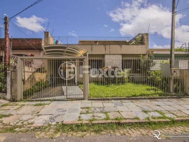 Casa com 4 quartos à venda na Rua Afonso Rodrigues, 403, Jardim Botânico, Porto Alegre, 161 m2 por R$ 700.000