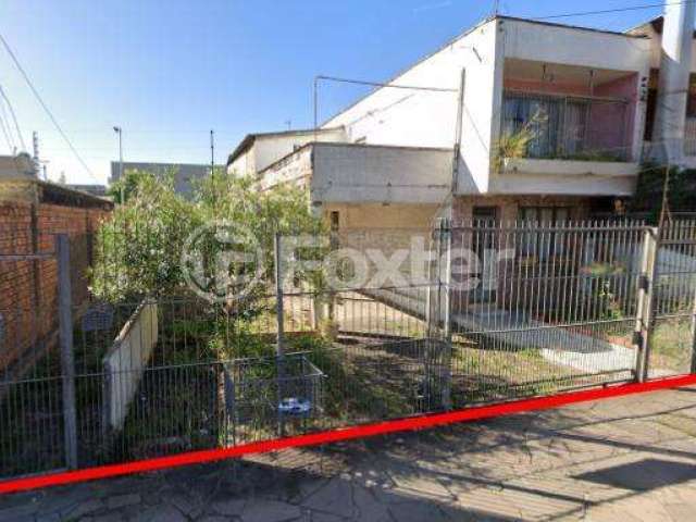 Casa com 3 quartos à venda na Rua Dona Margarida, 642, Navegantes, Porto Alegre, 475 m2 por R$ 950.000