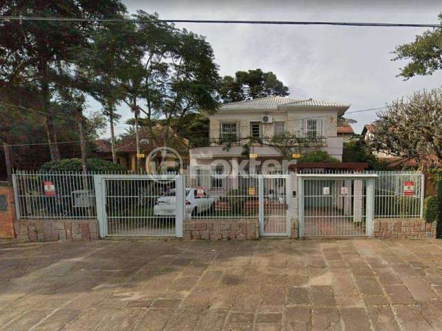 Casa com 4 quartos à venda na Avenida Guaíba, 664/10864, Ipanema, Porto Alegre, 301 m2 por R$ 1.980.000