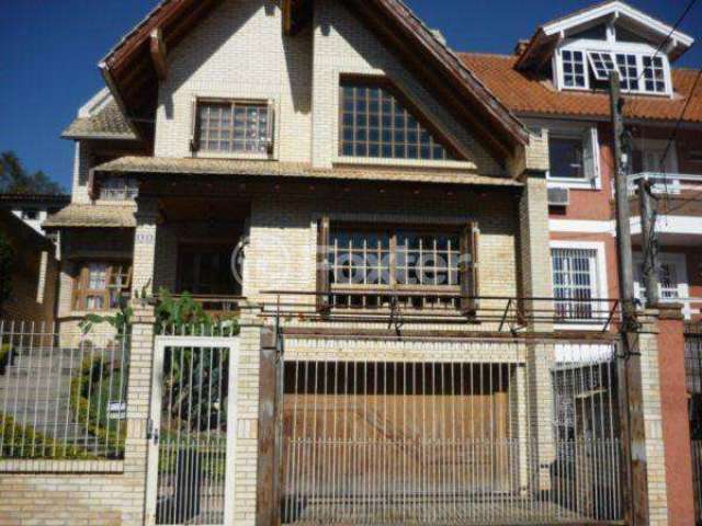 Casa com 3 quartos à venda na Rua Padre João Batista Reus, 629, Vila Conceição, Porto Alegre, 282 m2 por R$ 904.300