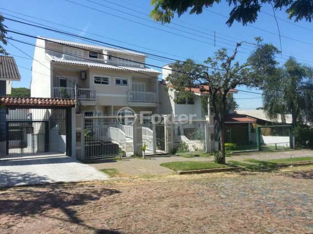 Casa com 3 quartos à venda na Rua Martin Luther King, 131, São Sebastião, Porto Alegre, 232 m2 por R$ 780.000