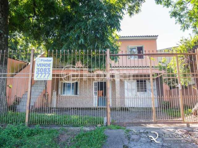 Casa com 2 quartos à venda na Avenida João Ferreira Jardim, 601, Rubem Berta, Porto Alegre, 260 m2 por R$ 479.000