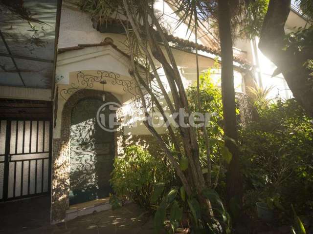 Casa com 3 quartos à venda na Rua Artigas, 371, Petrópolis, Porto Alegre, 281 m2 por R$ 650.000