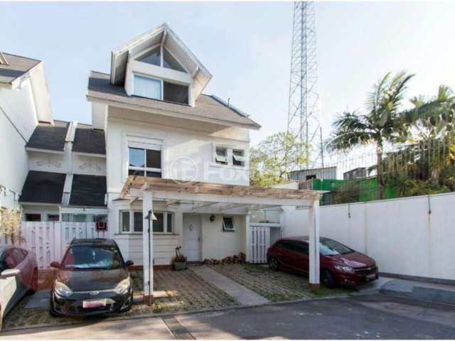 Casa em condomínio fechado com 3 quartos à venda na Rua Tocantins, 1120C, Lomba do Pinheiro, Porto Alegre, 149 m2 por R$ 1.030.000