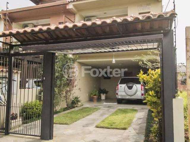 Casa com 3 quartos à venda na Rua Luís Felipe Monmany, 47, Espírito Santo, Porto Alegre, 119 m2 por R$ 600.000