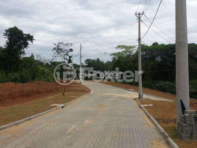 Terreno em condomínio fechado à venda na Avenida Senador Salgado Filho, 5087, Florescente, Viamão, 306 m2 por R$ 140.000