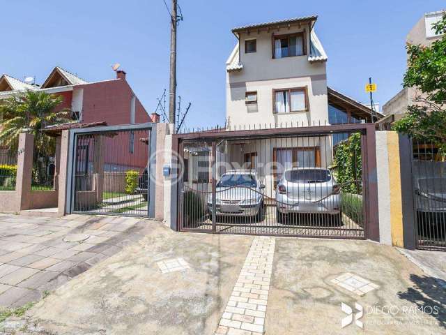 Casa com 3 quartos à venda na Rua Claudio da Silva Pinto, 221, Espírito Santo, Porto Alegre, 182 m2 por R$ 850.000