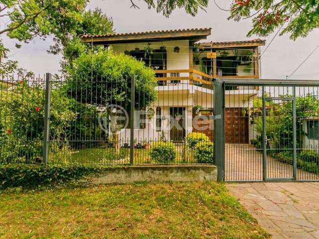 Casa com 4 quartos à venda na Rua Souza Lobo, 1210, Vila Jardim, Porto Alegre, 322 m2 por R$ 1.429.940