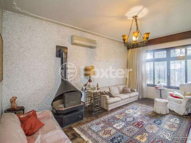 Casa com 4 quartos à venda na Rua Bernardino Caetano Fraga, 156, Santa Tereza, Porto Alegre, 258 m2 por R$ 796.000