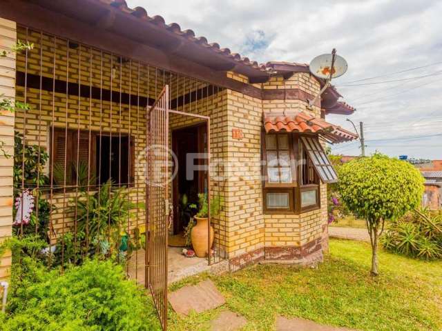 Casa com 3 quartos à venda na Rua Arthur Alberto Zanela, 110, Lomba do Pinheiro, Porto Alegre, 65 m2 por R$ 239.000