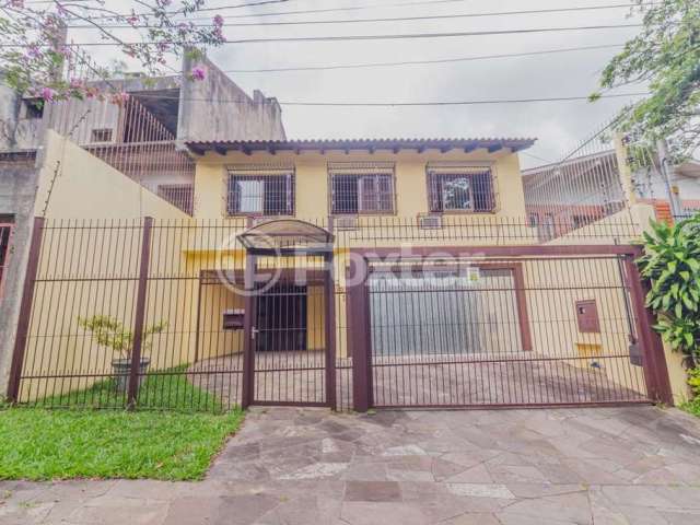 Casa com 4 quartos à venda na Rua João Paetzel, 751, Chácara das Pedras, Porto Alegre, 283 m2 por R$ 1.450.000