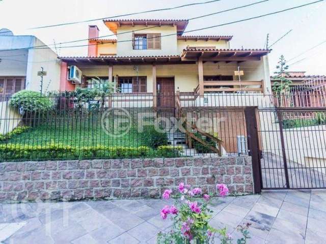 Casa com 4 quartos à venda na Rua Professor Bertrand Russel, 158, Vila Ipiranga, Porto Alegre, 380 m2 por R$ 1.470.000