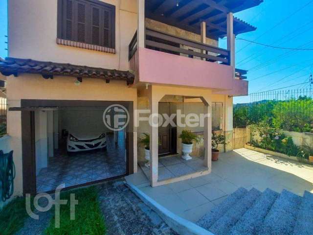 Casa com 4 quartos à venda na Rua Engenheiro Oscar da Cunha Corrêa, 163, Jardim Carvalho, Porto Alegre, 240 m2 por R$ 425.000
