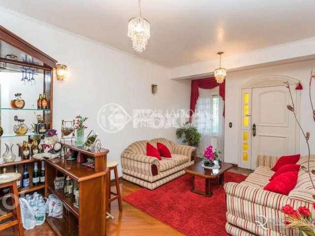 Casa com 4 quartos à venda na Rua Monte Alegre, 137, Jardim Floresta, Porto Alegre, 341 m2 por R$ 1.100.000