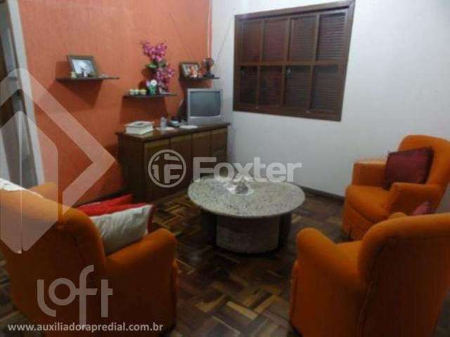 Casa com 5 quartos à venda na Rua Flor de Pessegueiro, 27, Vila Nova, Porto Alegre, 520 m2 por R$ 792.000