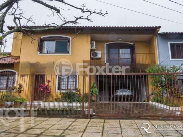 Casa com 6 quartos à venda na Rua André Primo Biazetto, 6, Campo Novo, Porto Alegre, 330 m2 por R$ 1.100.000