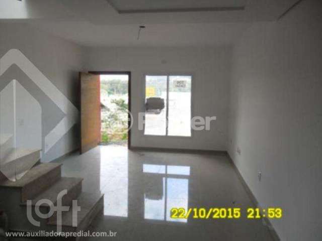 Casa com 3 quartos à venda na Avenida Vereador Roberto Landell de Moura, 328, Campo Novo, Porto Alegre, 101 m2 por R$ 345.000