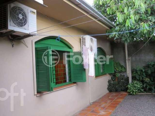 Casa com 3 quartos à venda na Avenida Delmar Rocha Barbosa, 428, Parque Santa Fé, Porto Alegre, 120 m2 por R$ 522.500